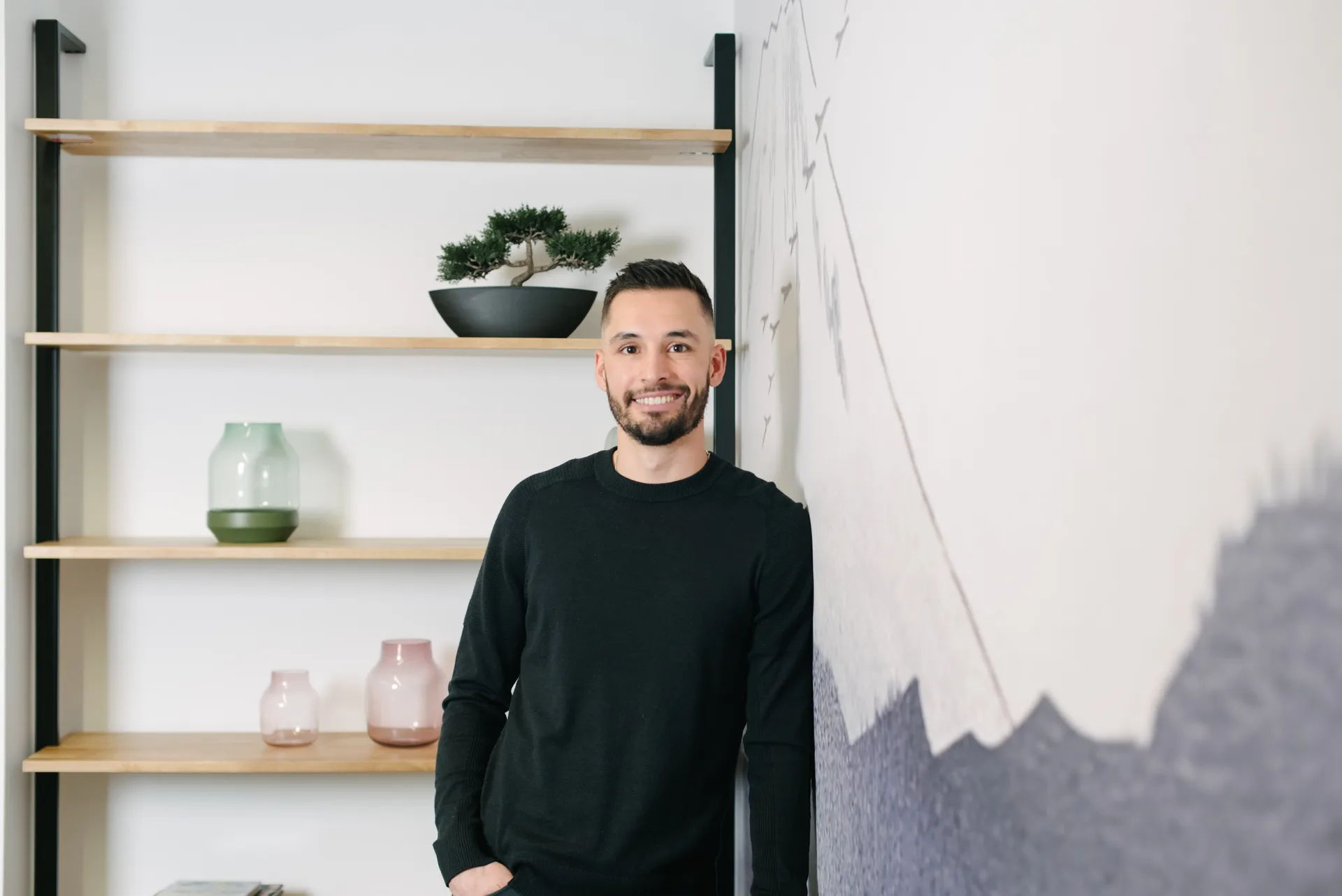 John Paterson standing in the Quadshift office